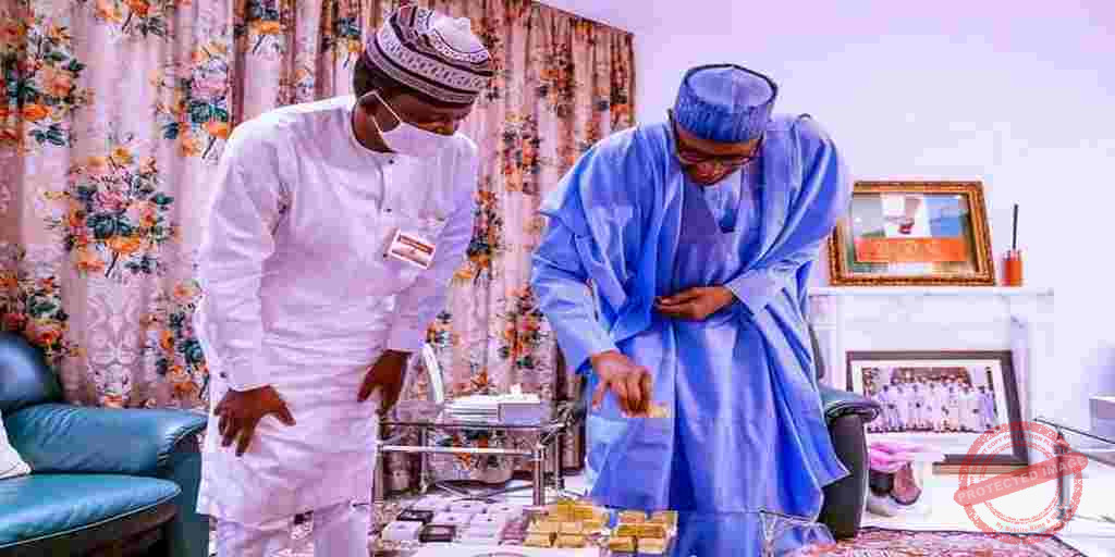 Buhari and Matawalle check the GOLD Bars and Precious Stones from Zamfara